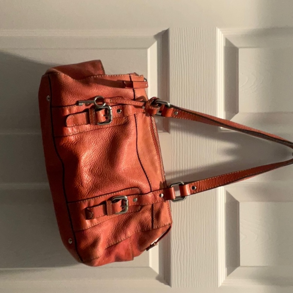 Pop Of Color gentle aged FOSSIL tangerine leather tote.